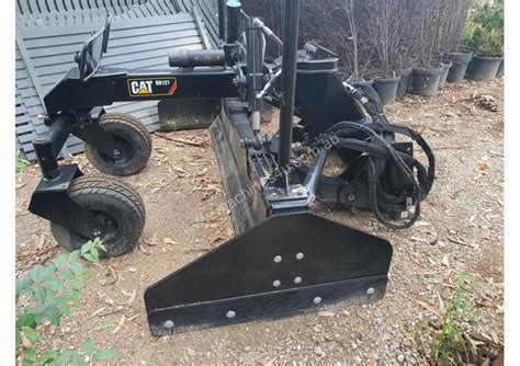 cat skid steer with dozer blade|bobcat skid steer box blade.